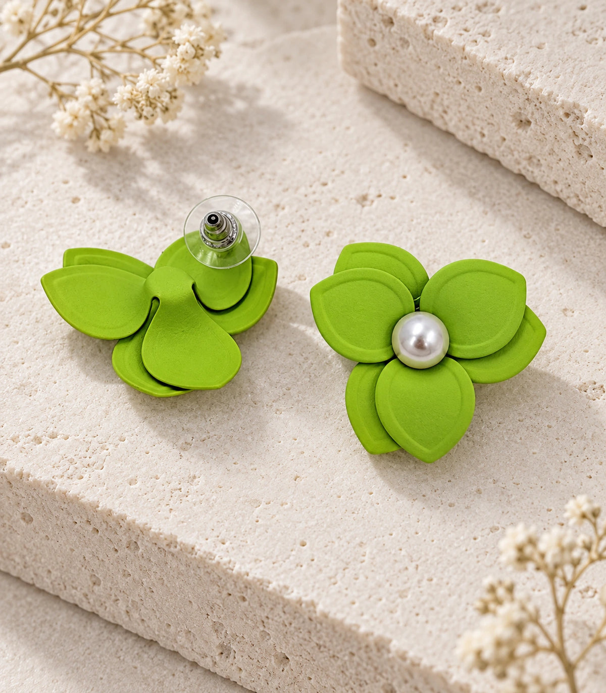 JIMIKI Lime Triple Petal Pearl Flower Stud Earrings - pair in styled flat lay #color_lime