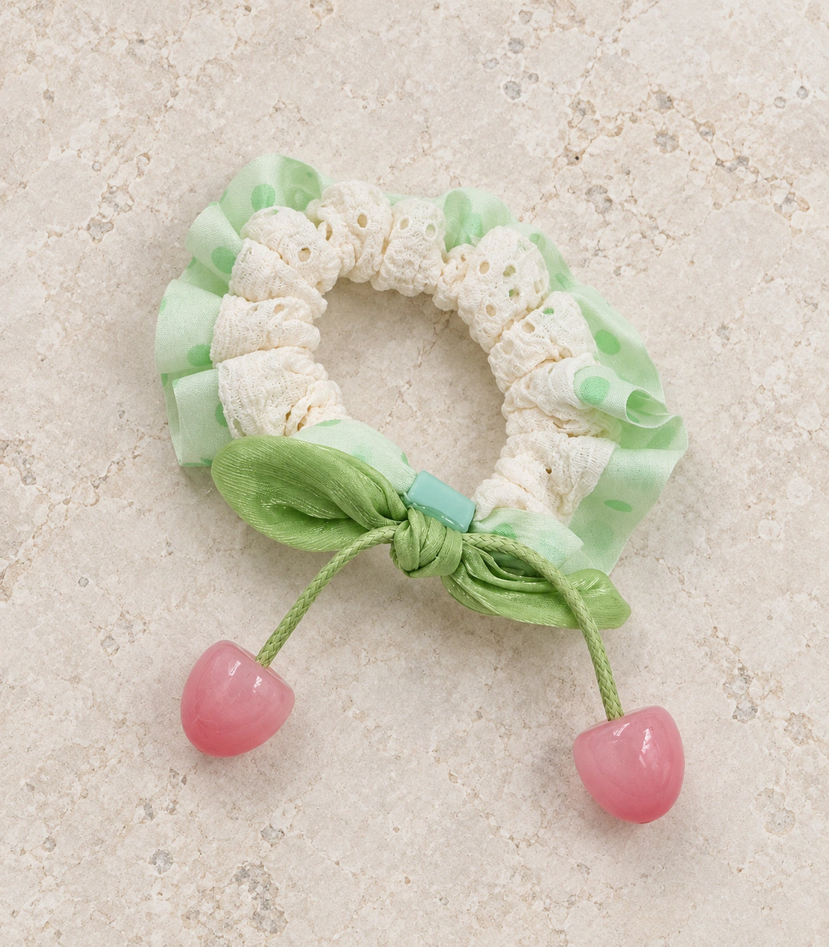 JIMIKI Polka Dot Lace Scrunchie With Cherry Charms in Mint, editorial flat lay #color_mint