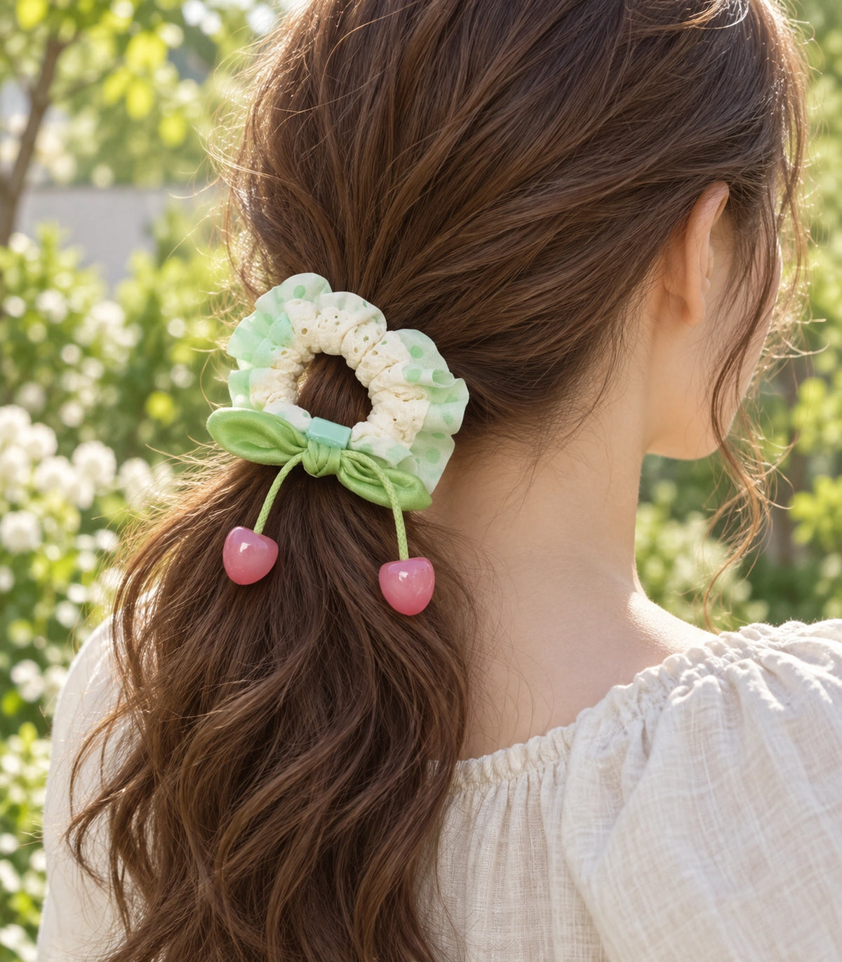 JIMIKI Polka Dot Lace Scrunchie With Cherry Charms in Mint, editorial model view #color_mint