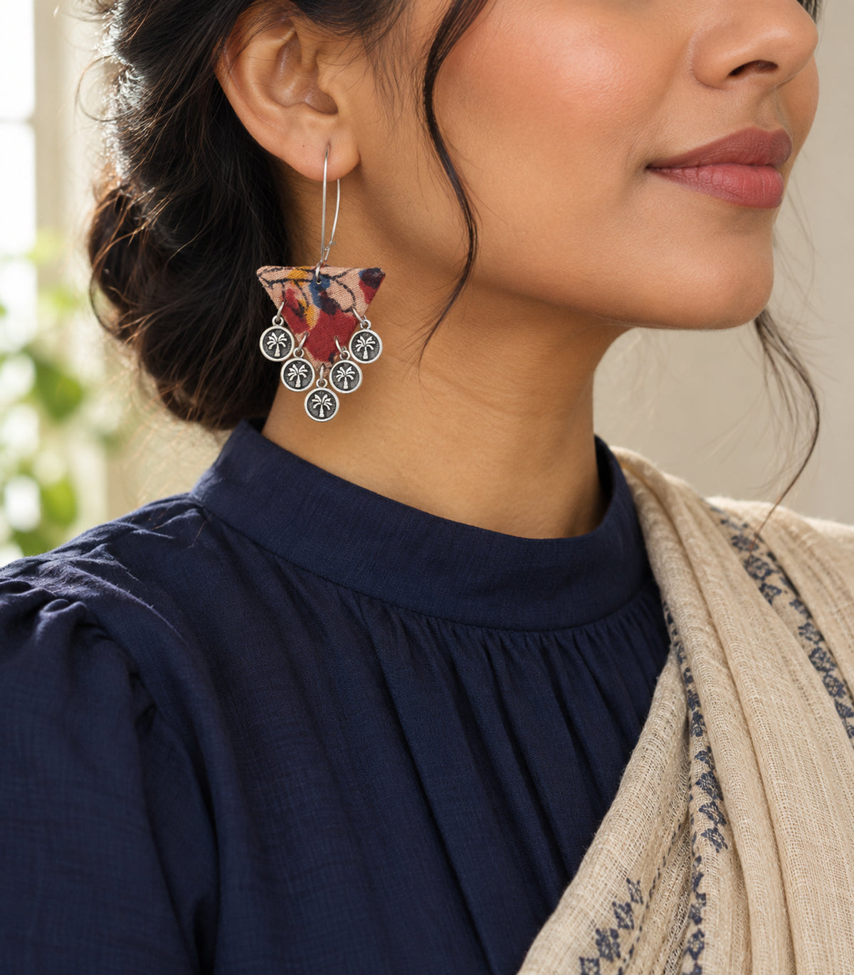 Multicolour triangle fabric coin earrings — editorial worn view