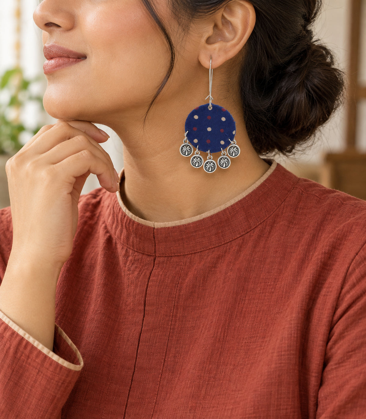 Navy dotted round fabric coin earrings - editorial model view