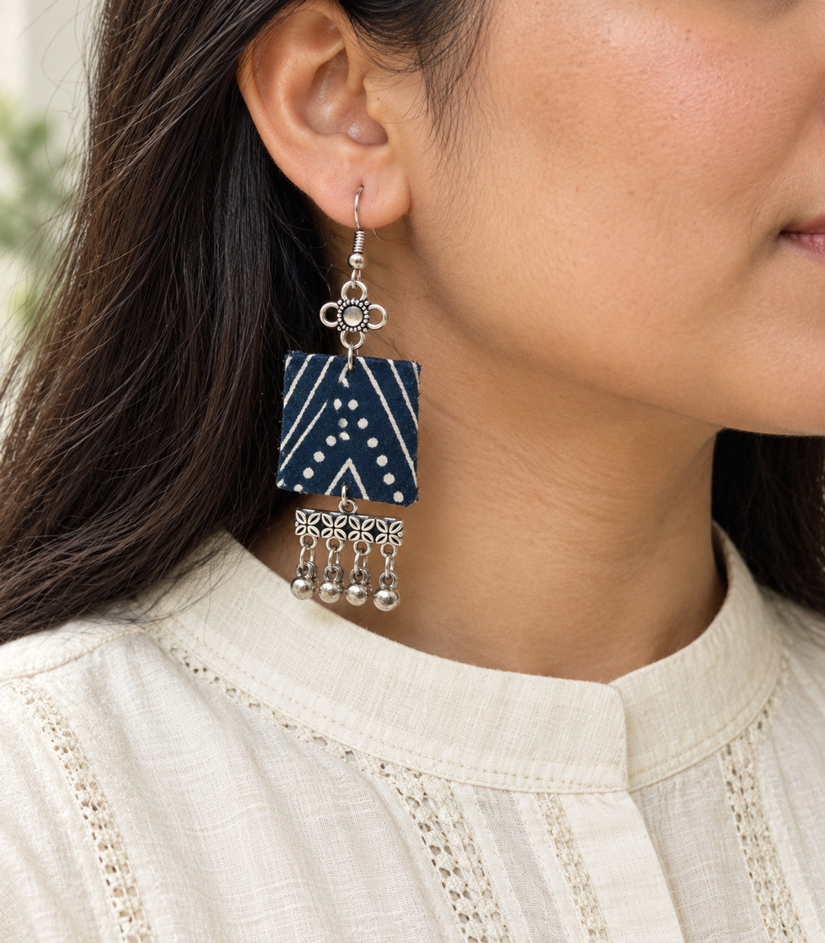 Navy and ivory square floral fringe fabric earrings — closeup view
