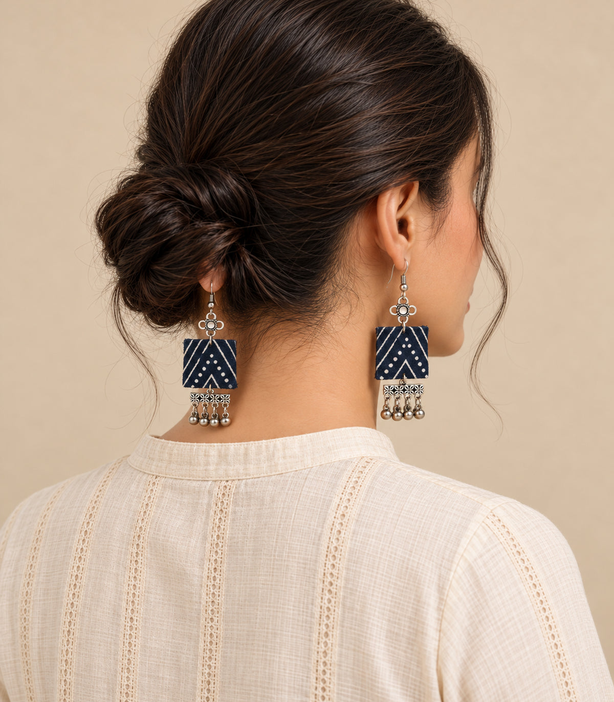 Navy and ivory square floral fringe fabric earrings — model view