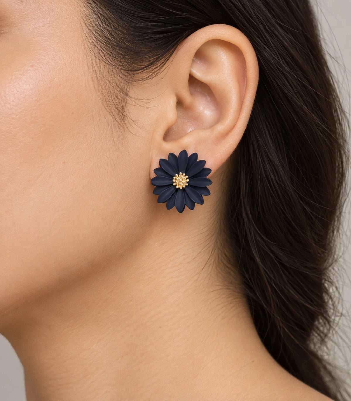 JIMIKI Navy layered starburst daisy stud earrings, layered daisy stud worn at the ear #color_navy