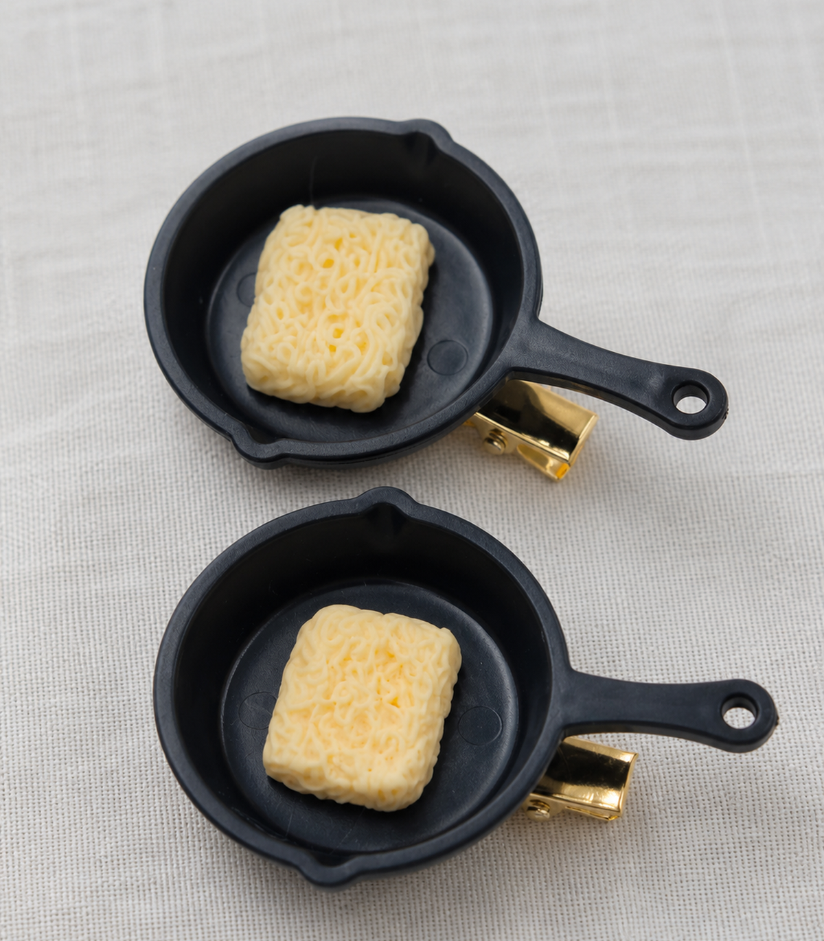 Noodle Pan Barrette Pair close-up view