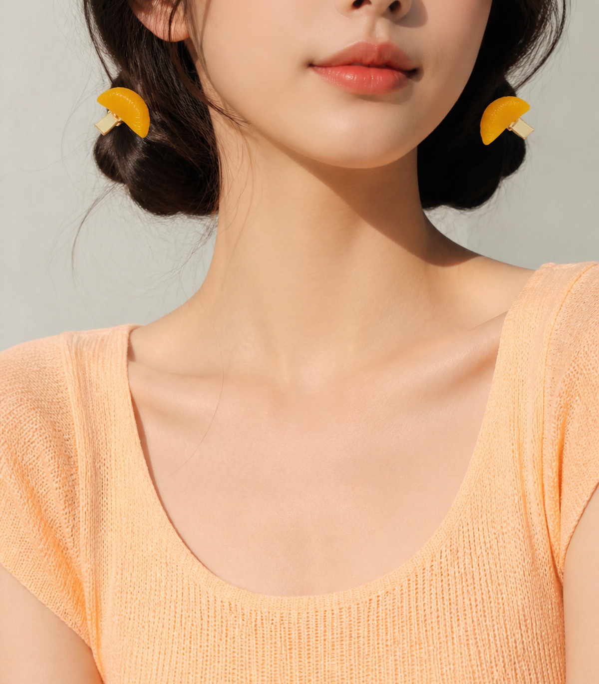 Orange Segment Barrette Pair styled editorial view