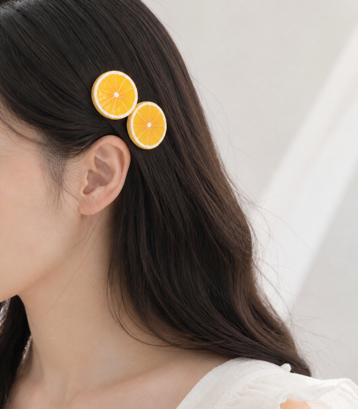 Orange Slice Barrette Pair worn in hair