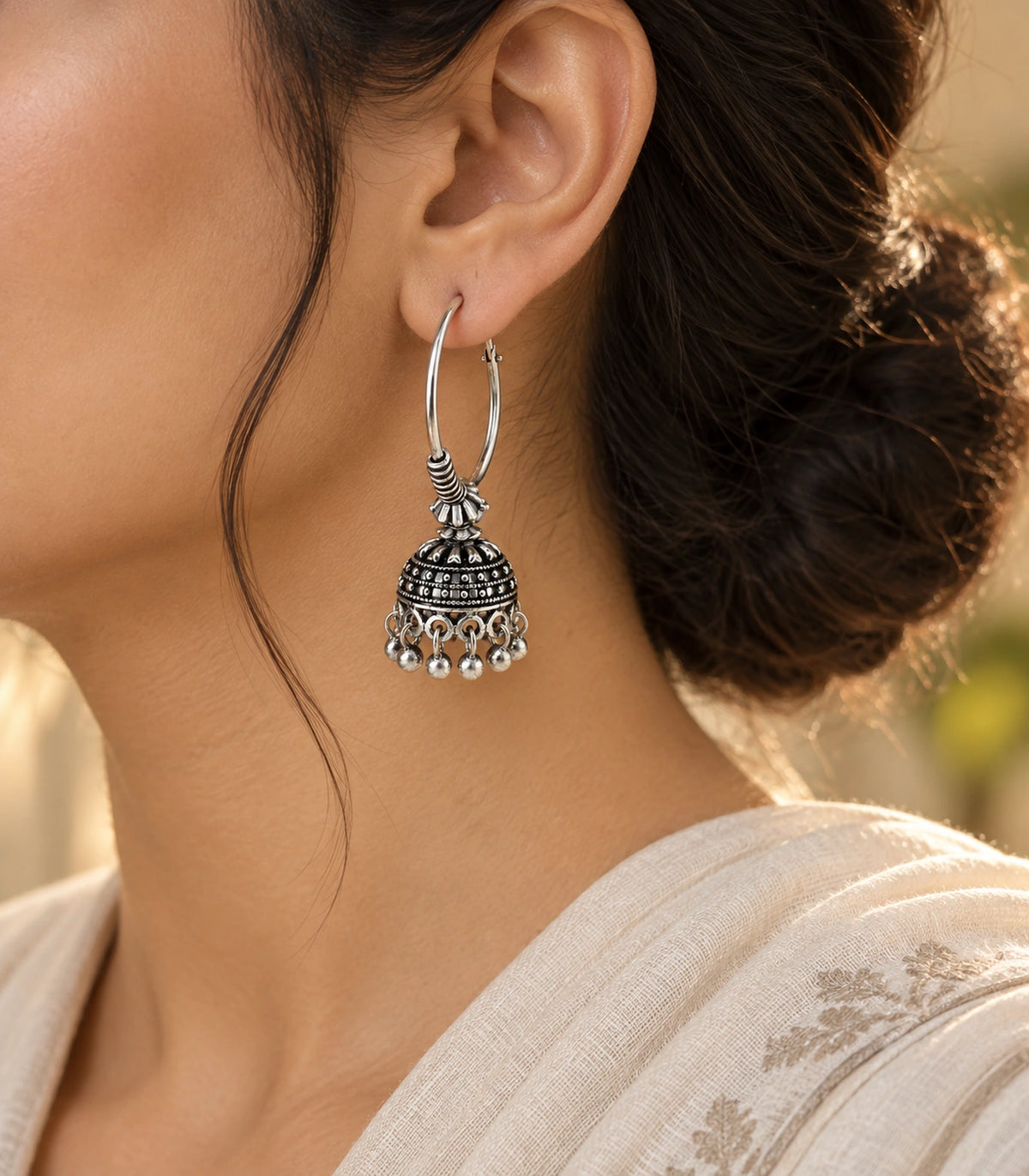JIMIKI Oxidized Silver Beaded Hoop Jhumka Earrings - editorial styling with hair swept back #color_oxidized-silver