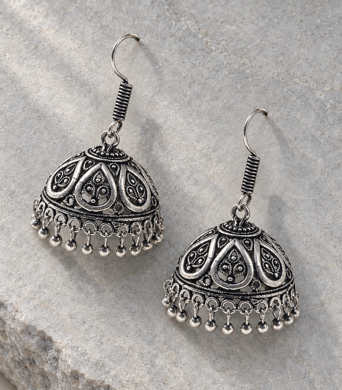 JIMIKI Oxidized Silver Openwork Teardrop Hook Jhumka Earrings in Oxidized Silver - editorial flatlay #color_oxidized-silver