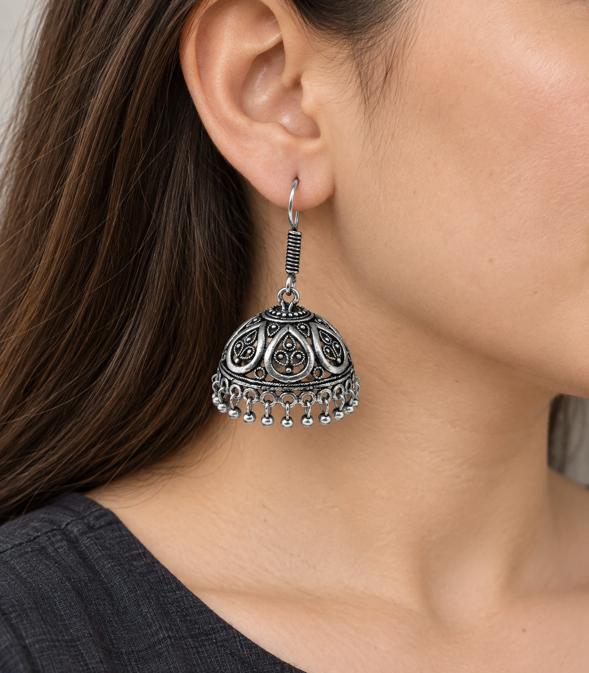 JIMIKI Oxidized Silver Openwork Teardrop Hook Jhumka Earrings in Oxidized Silver - worn styling view #color_oxidized-silver