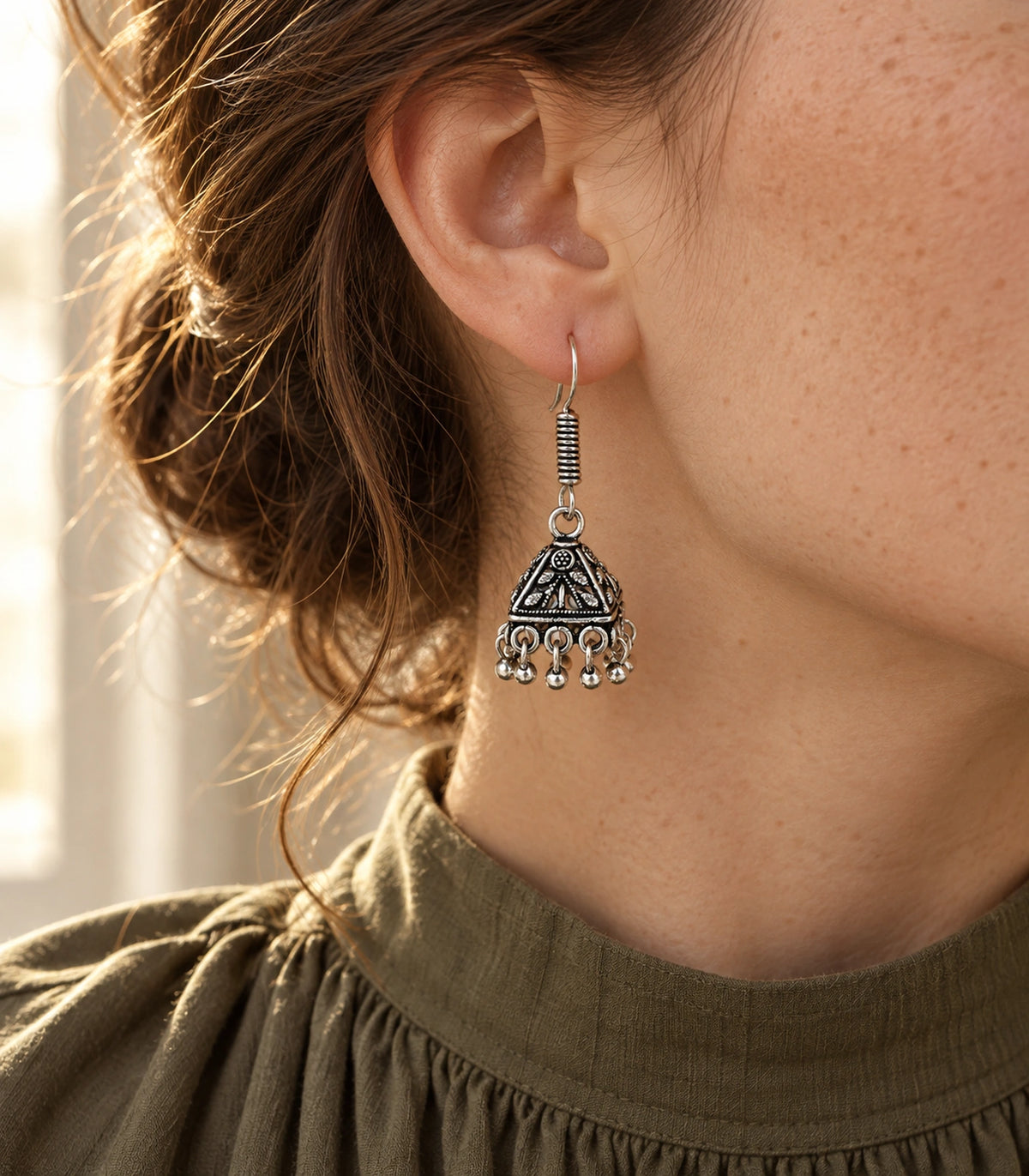 JIMIKI Pyramid Floral Hook Jhumka Earrings in Oxidized Silver - editorial worn view #color_oxidized-silver