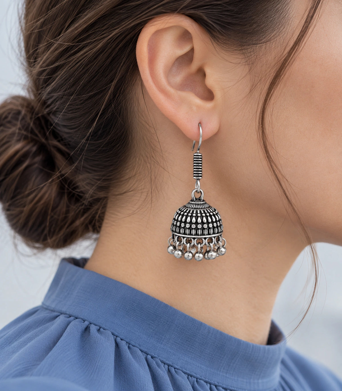 JIMIKI Oxidized Silver Rosette Teardrop Jhumka Earrings - styled model wearing the earring #color_oxidized-silver