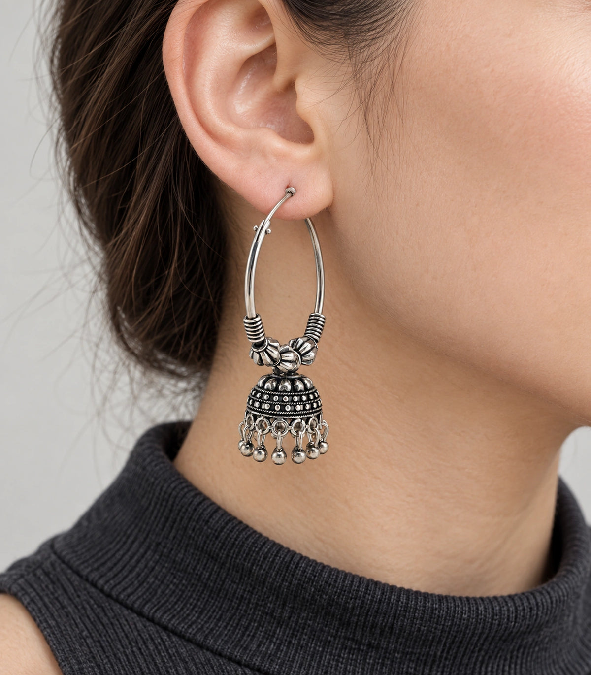 JIMIKI Oxidized Silver Three Bead Hoop Banded Jhumka Earrings in Oxidized Silver - worn styling view #color_oxidized-silver