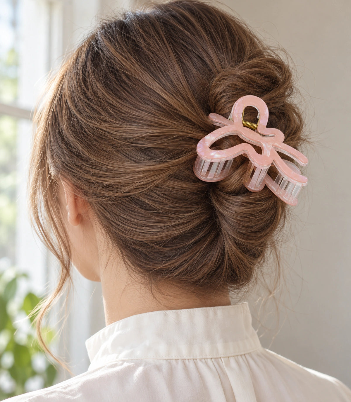 JIMIKI Iridescent Butterfly Hair Claw Clips in Peach, editorial model view #color_peach