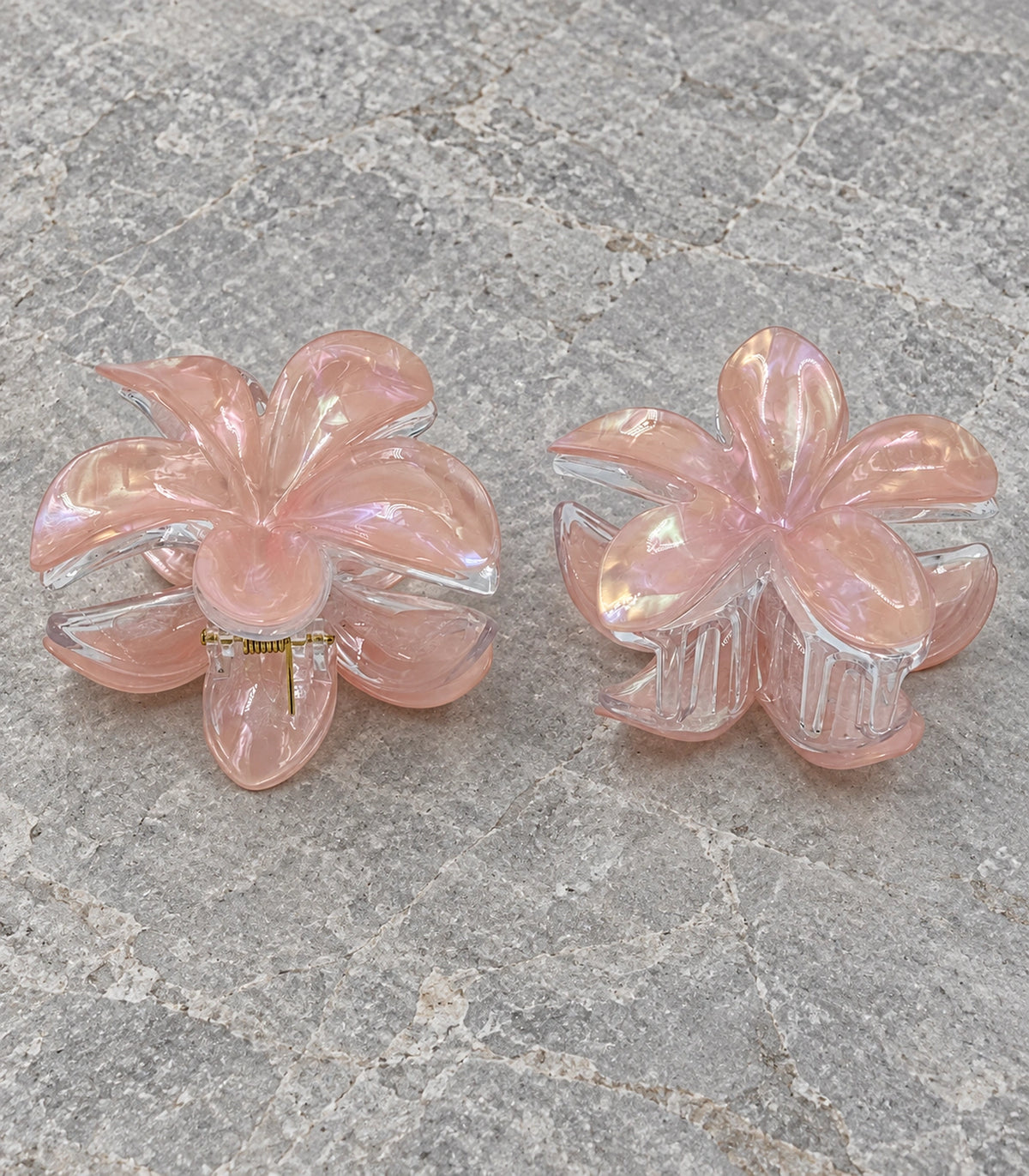 JIMIKI Iridescent Five Petal Flower Hair Claw Clips in Peach / Pink, editorial flat lay #color_peach / pink