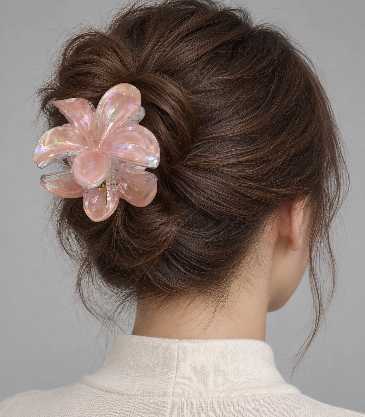 JIMIKI Iridescent Five Petal Flower Hair Claw Clips in Peach / Pink, model wearing view #color_peach / pink