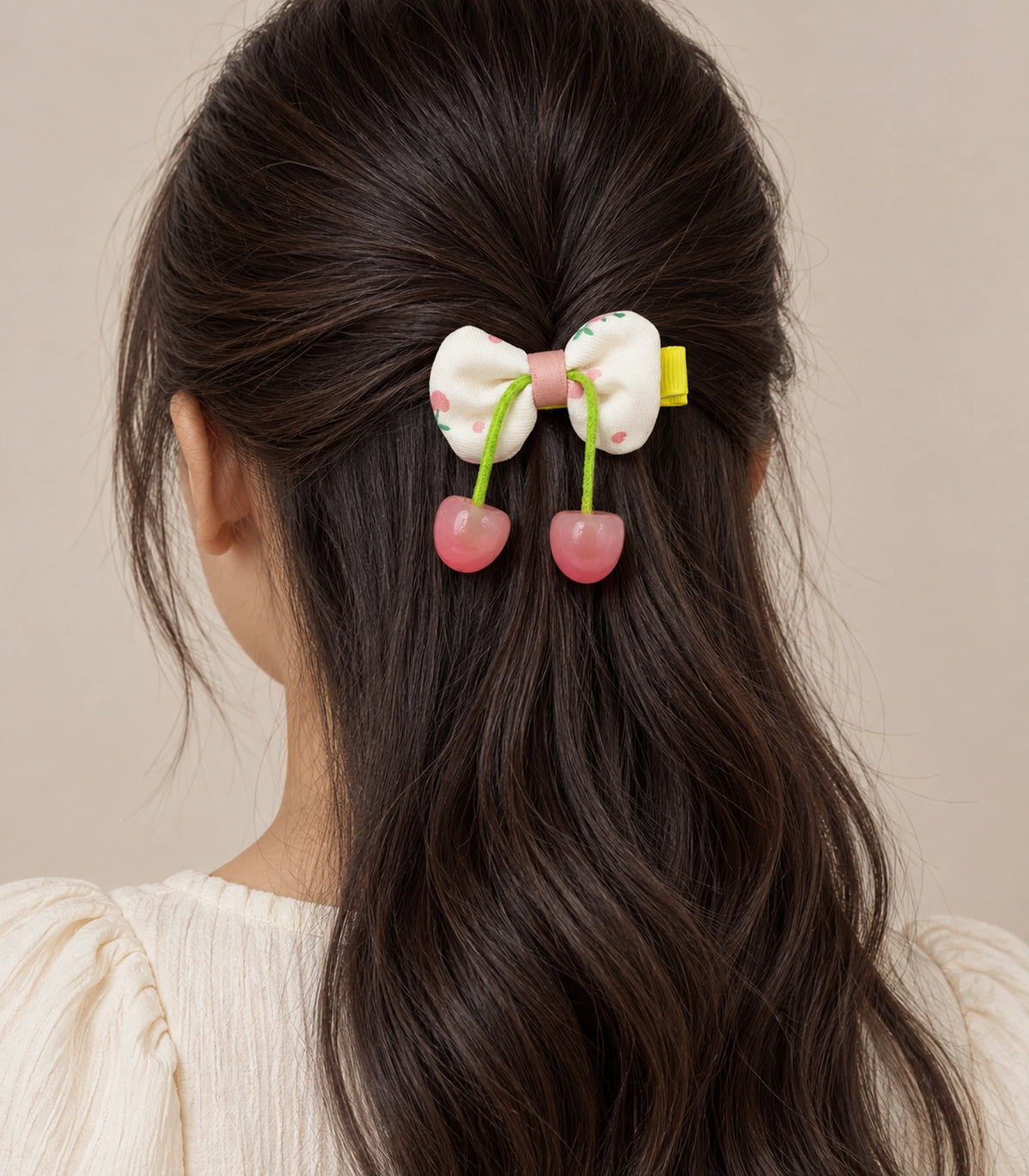 JIMIKI Cherry Print Bow Hair Clip With Cherry Charms in Pink, model wearing view #color_pink