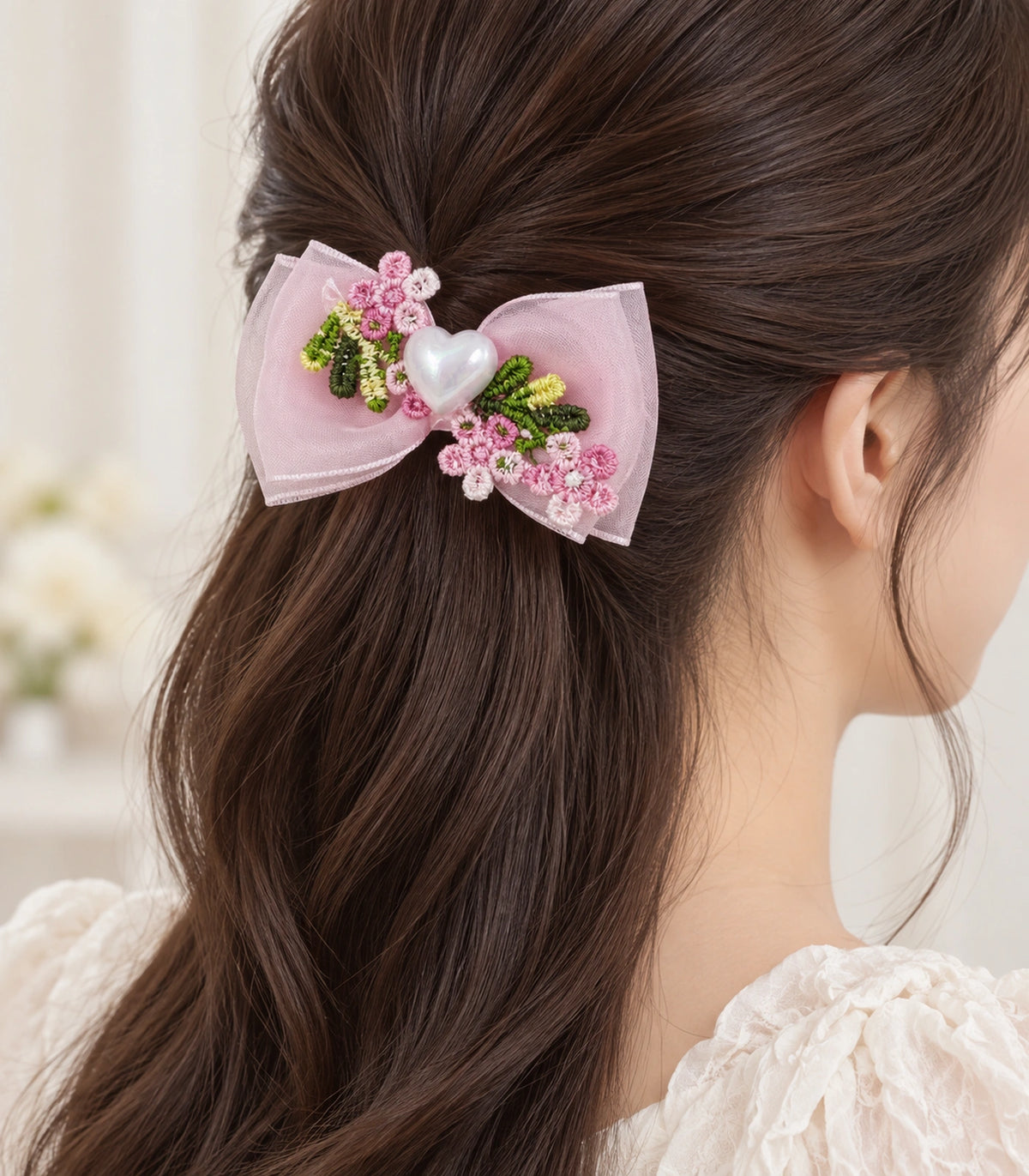 JIMIKI Pink Floral Pearl Heart Bow Hair Clip in Pink / Multicolor, model wearing view