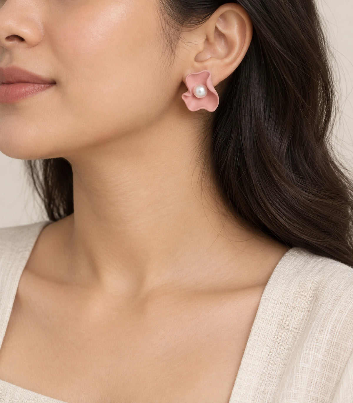 JIMIKI Folded Calla Pearl Stud Earrings, Pink — worn on the ear #color_pink