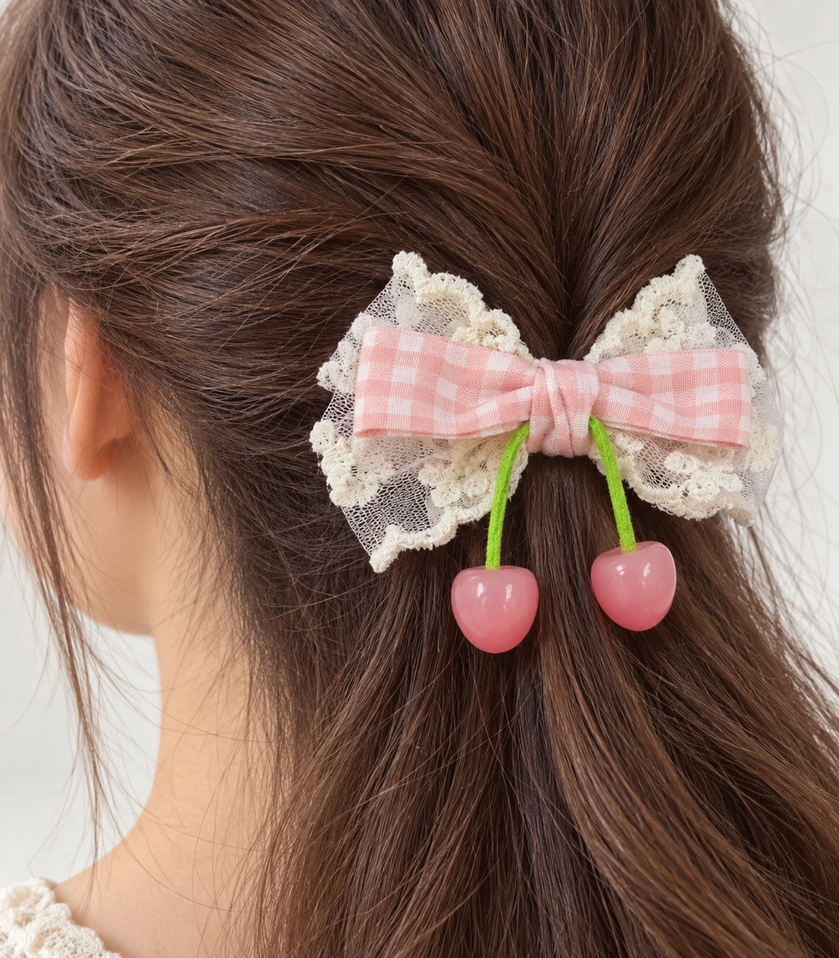 JIMIKI Pink Gingham Lace Bow Hair Clip with Cherry Charms in Pink, close-up detail