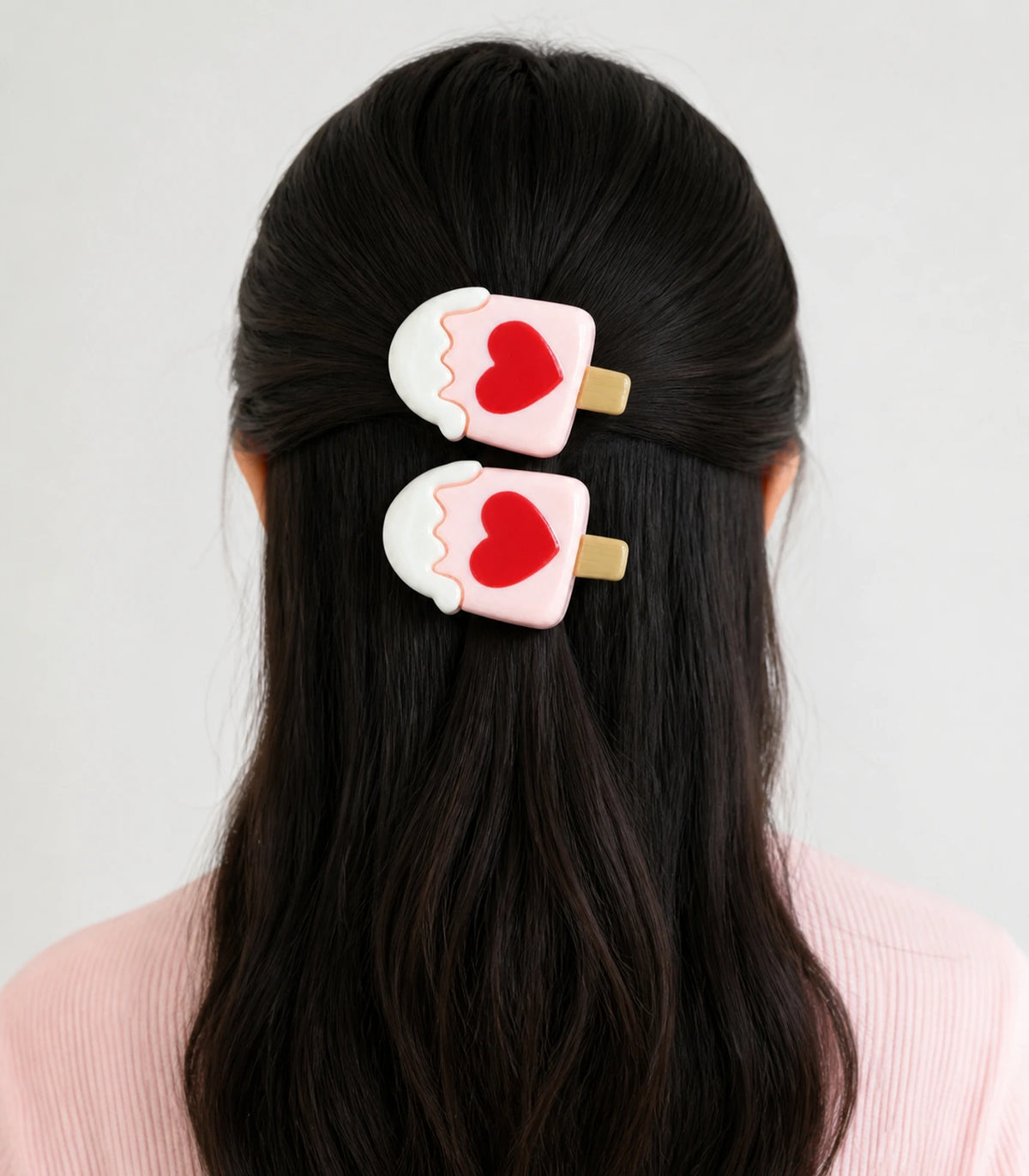 Model wearing the Pink Heart Frosted Popsicle Clip Pair