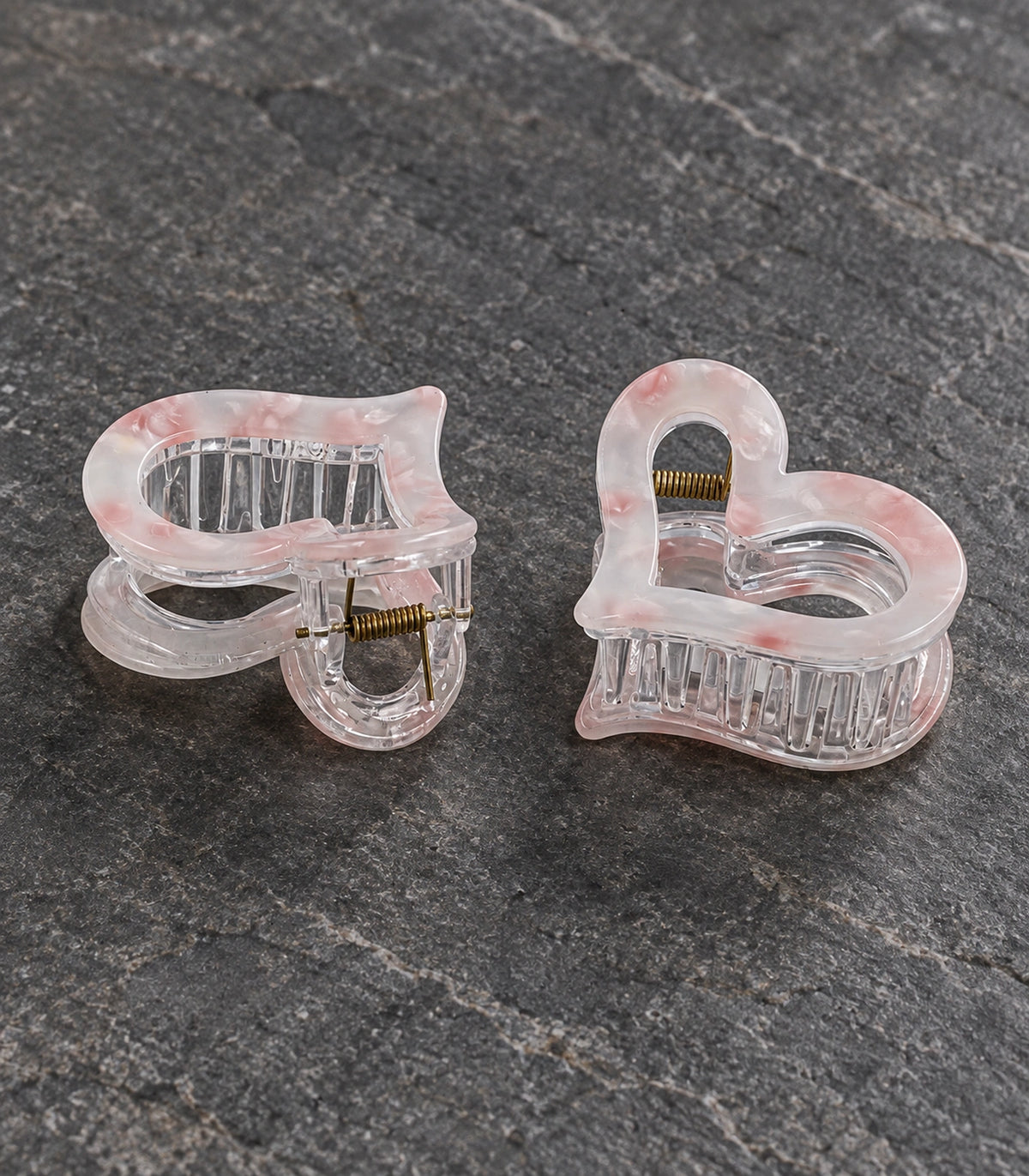 JIMIKI Marbled Heart Hair Claw Clips in Pink, editorial flat lay #color_pink