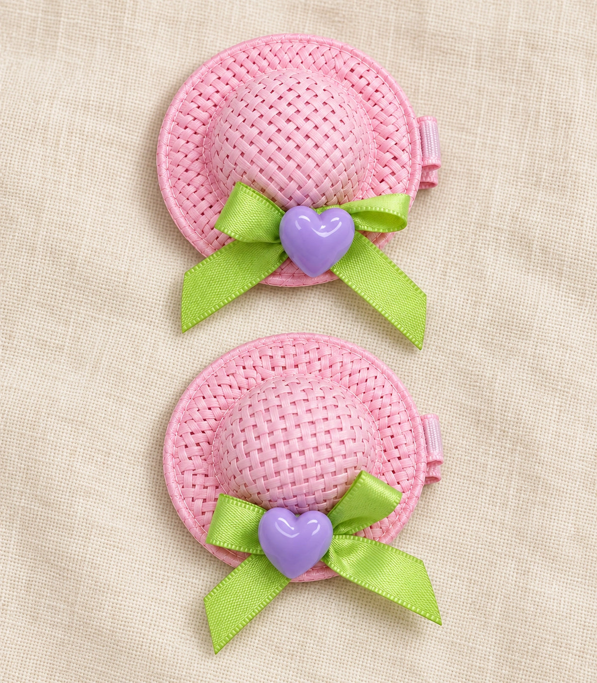 JIMIKI Mini Hat Hair Clips With Hearts in Pink / Lavender, editorial flat lay #color_pink / lavender
