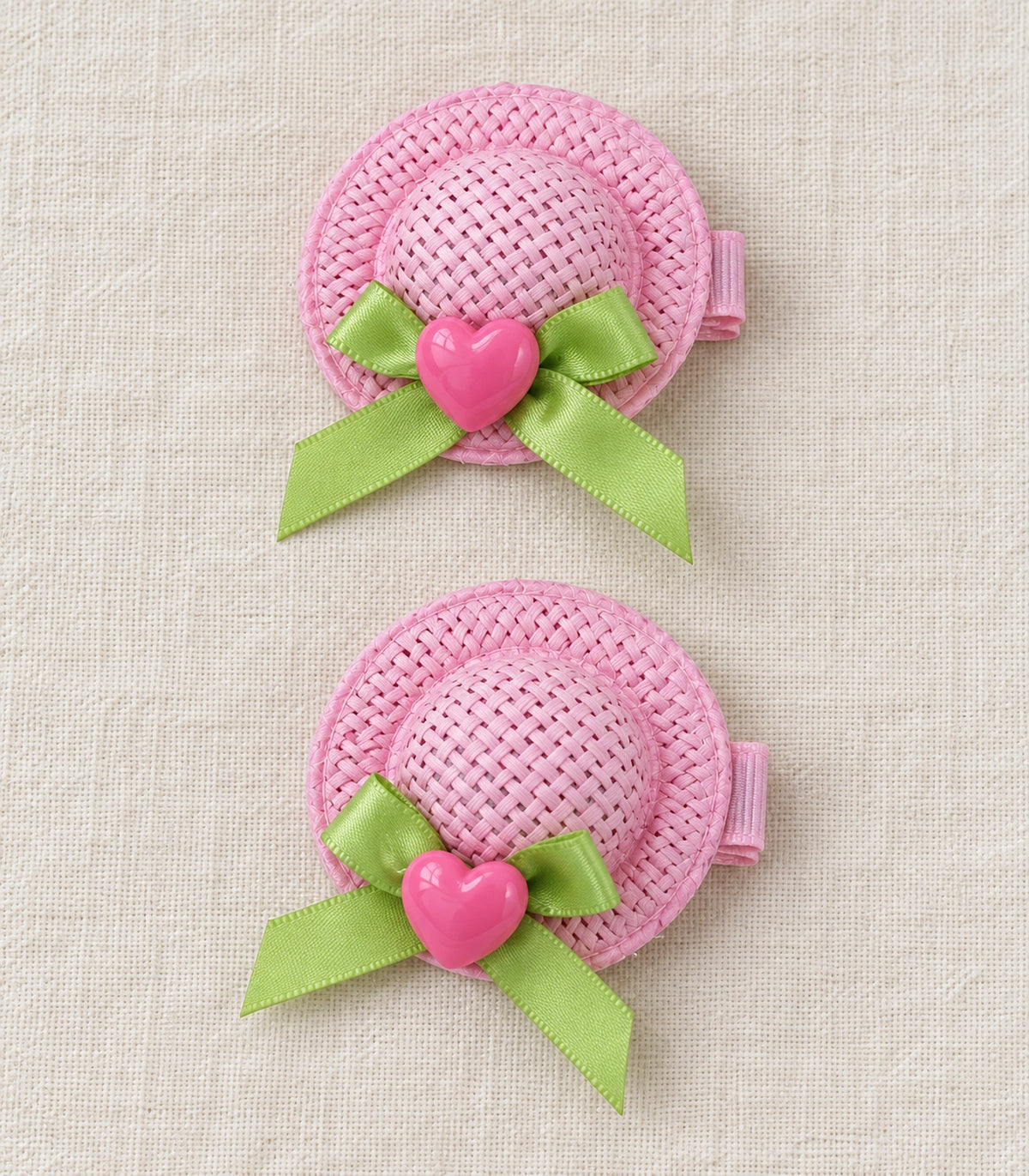 JIMIKI Mini Hat Hair Clips With Hearts in Pink, editorial flat lay #color_pink