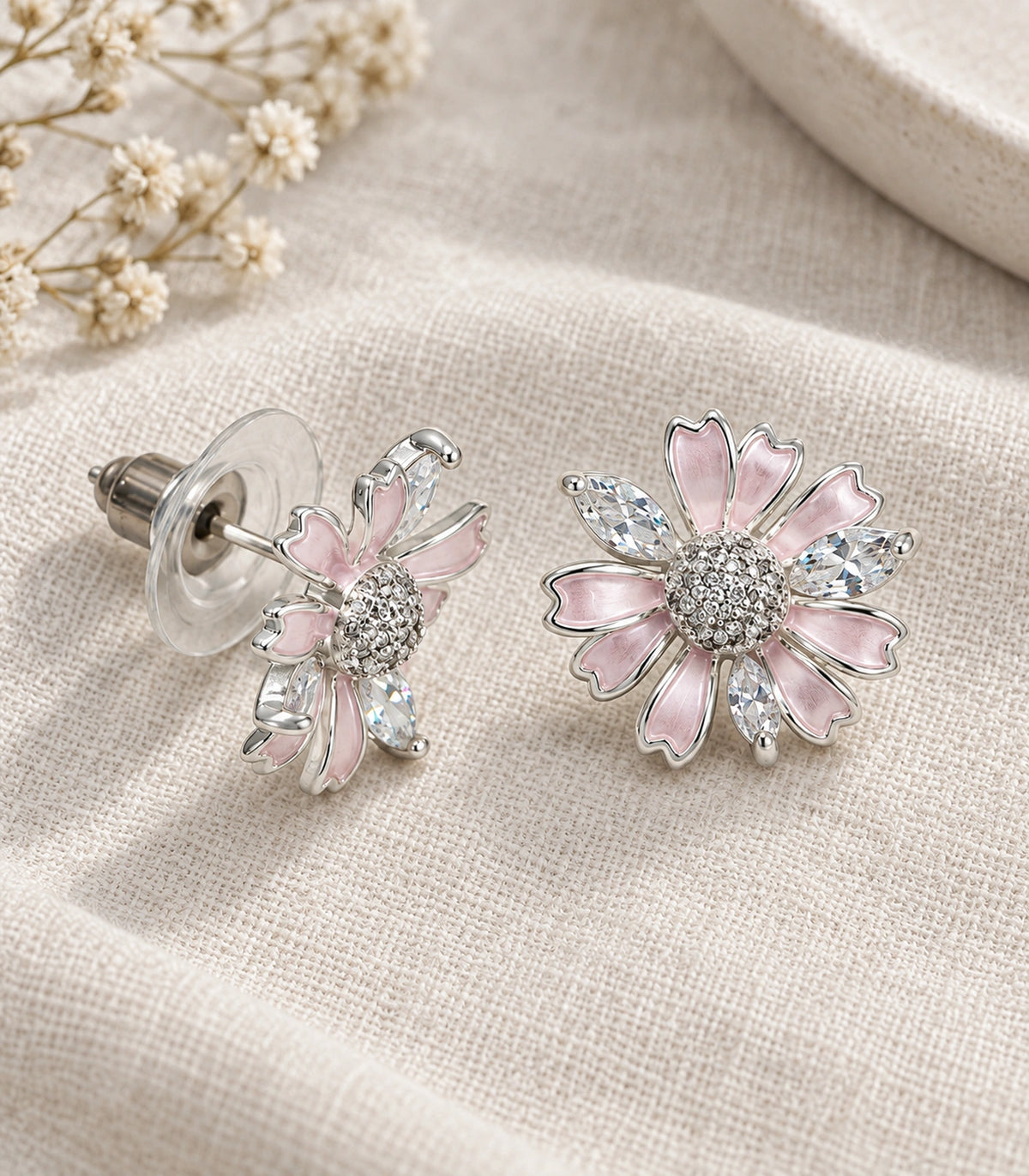 JIMIKI Petal Crystal Flower Stud Earring Pair in Pink / silver tone, editorial flat lay #color_pink / silver tone