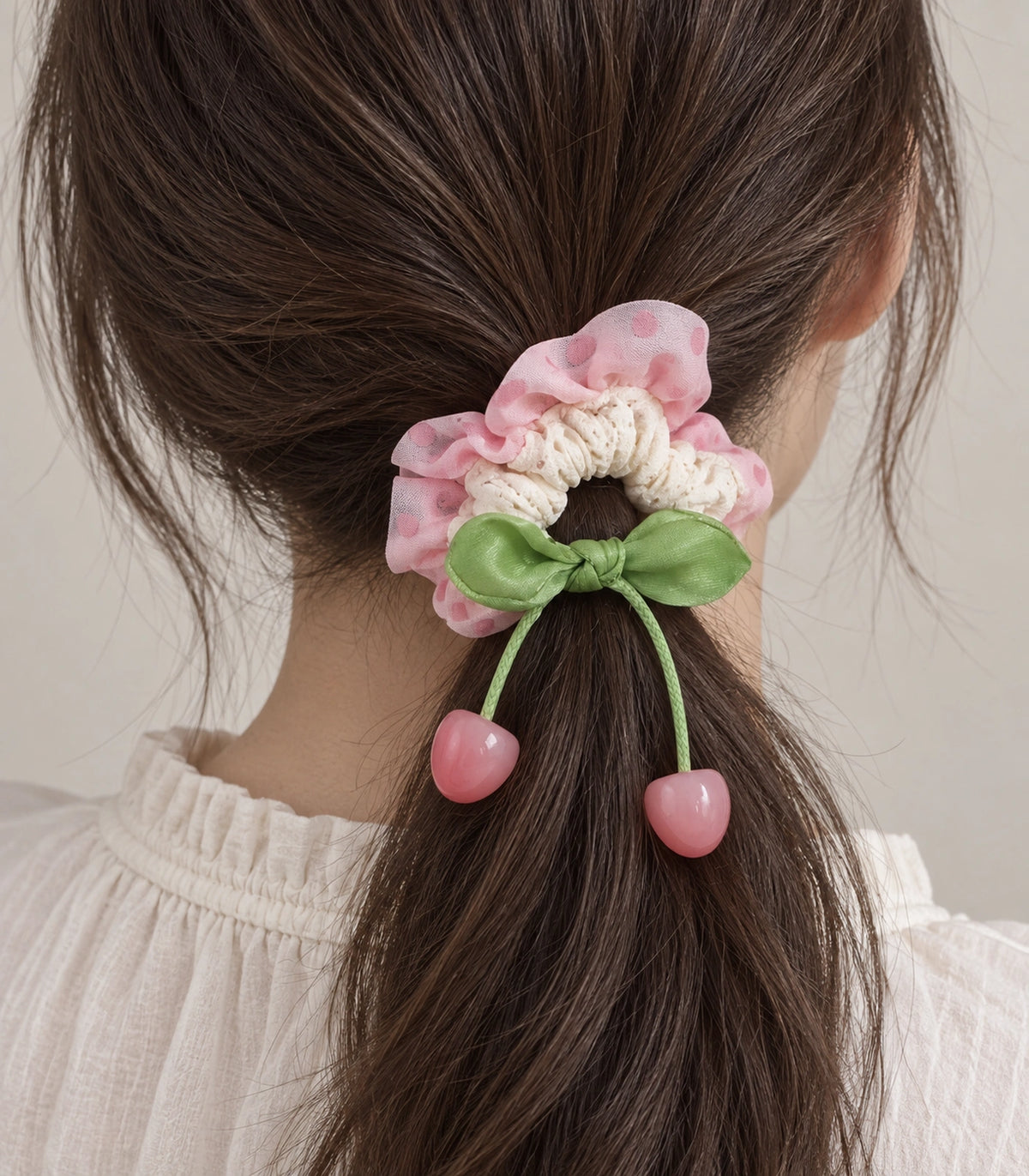 JIMIKI Polka Dot Lace Scrunchie With Cherry Charms in Pink, close-up detail #color_pink