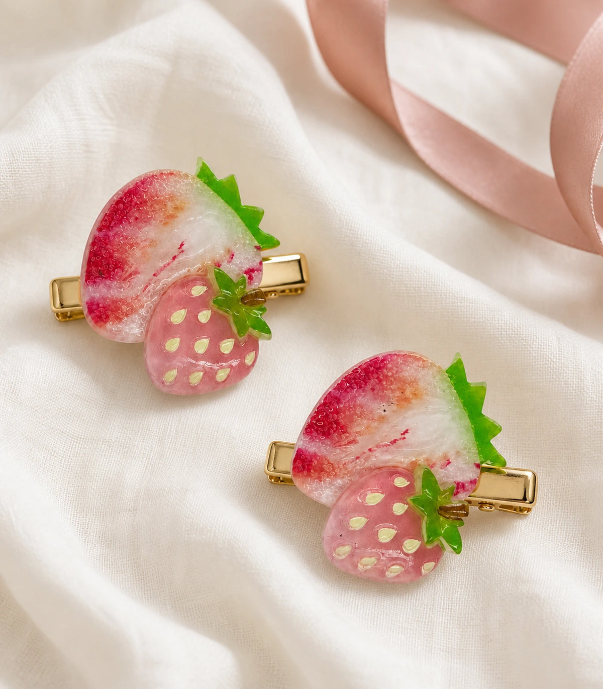 Editorial flat lay of the Pink Strawberry Duo Clip Pair