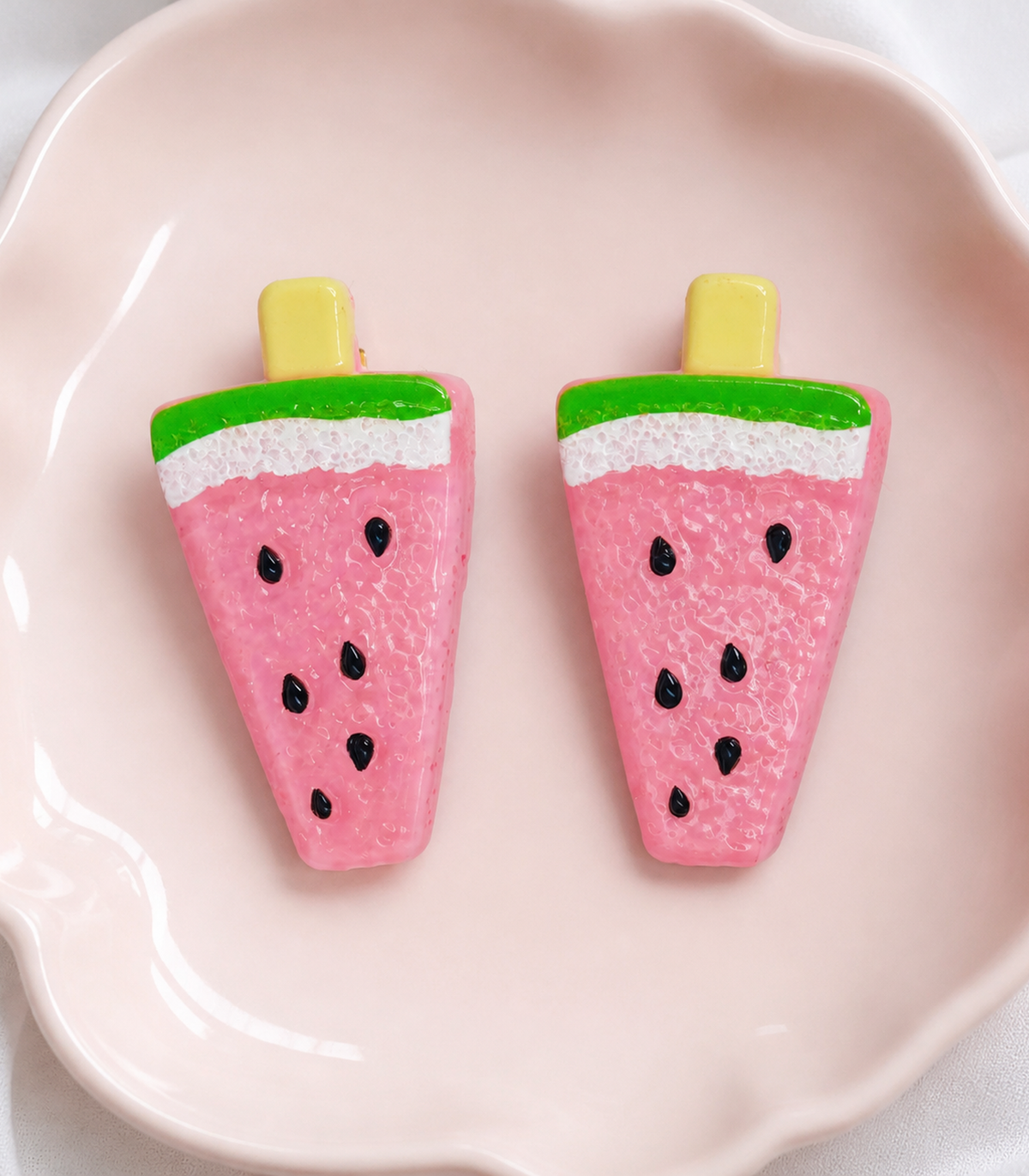 Pink Watermelon Barrette Pair editorial flat lay