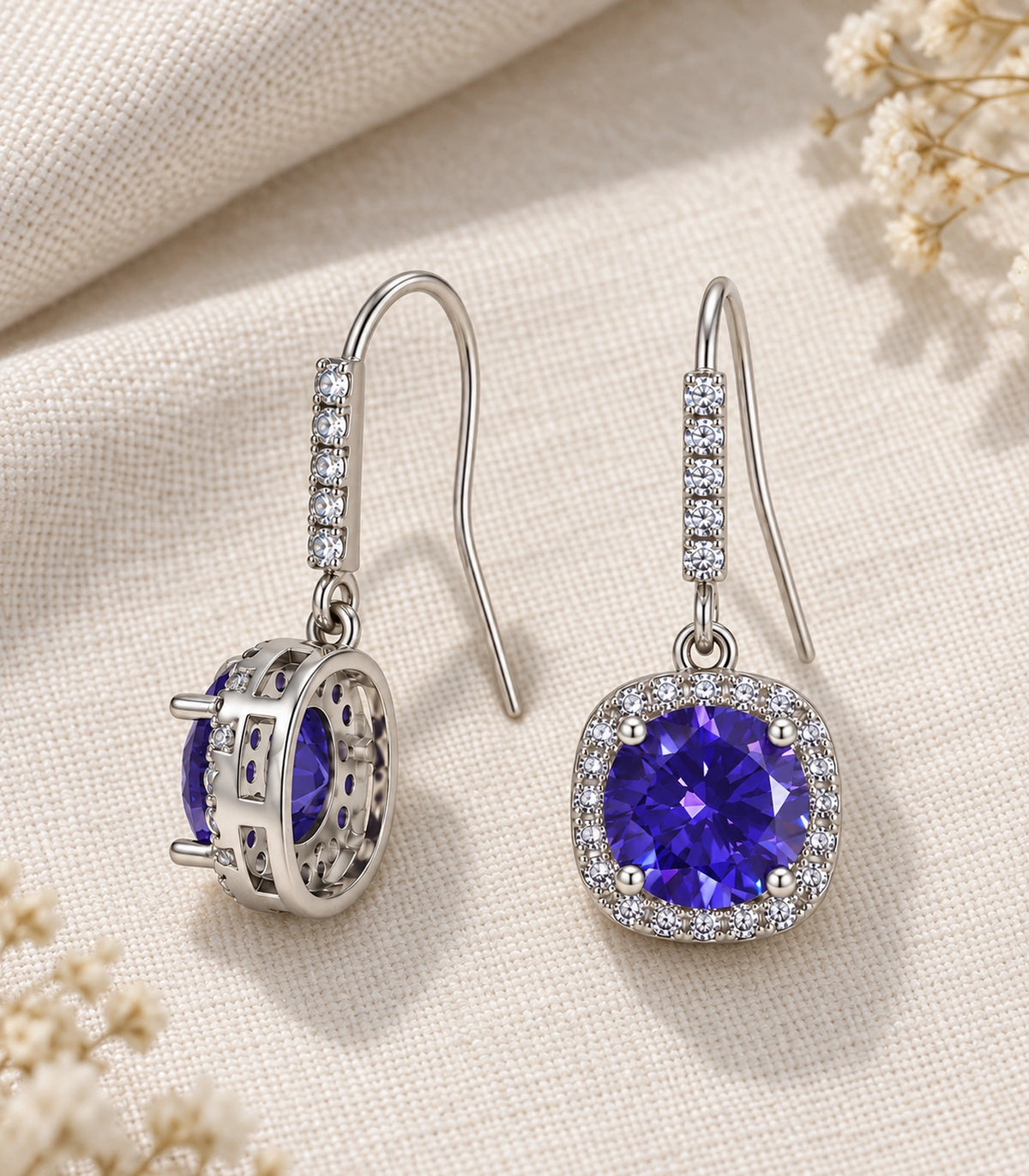 JIMIKI Crystal Cushion Halo Hook Earring Pair in Purple / silver tone, editorial flat lay #color_purple / silver tone