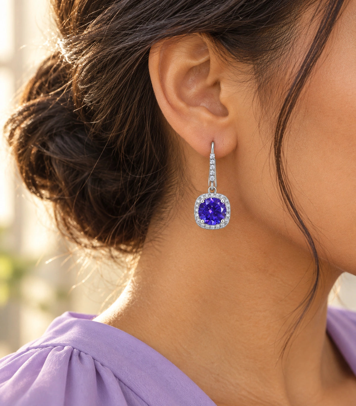 JIMIKI Crystal Cushion Halo Hook Earring Pair in Purple / silver tone, editorial model view #color_purple / silver tone