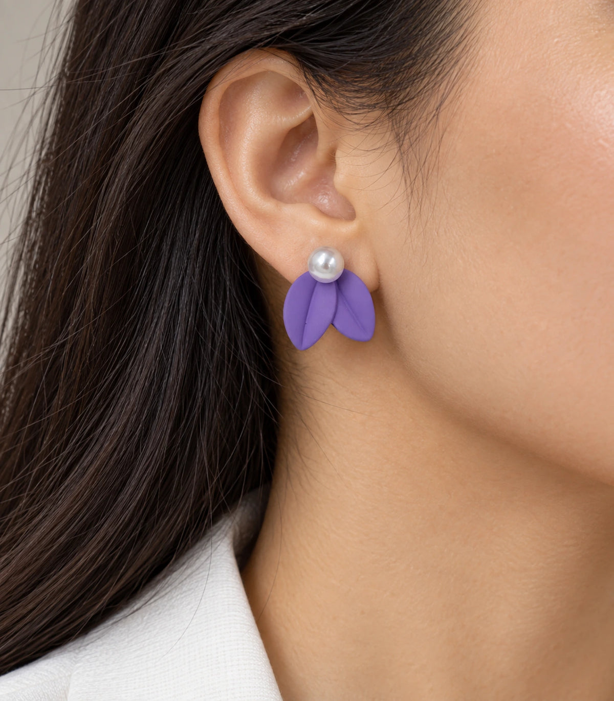 JIMIKI Double Leaf Pearl Stud Earrings in Purple — earrings worn on the ear #color_purple