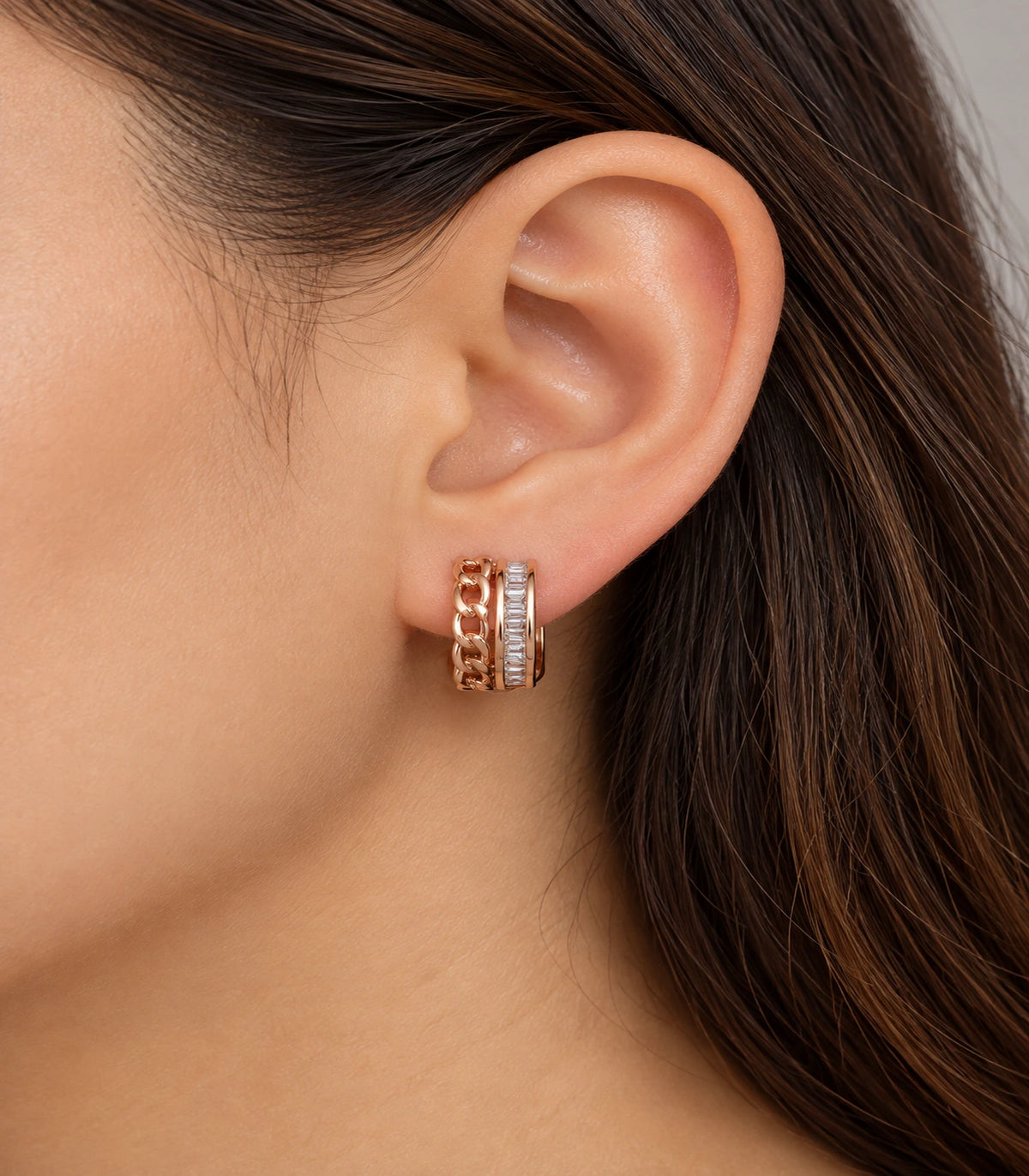 JIMIKI rose gold baguette chain double row huggie earrings, worn on the ear #color_rose-gold-tone