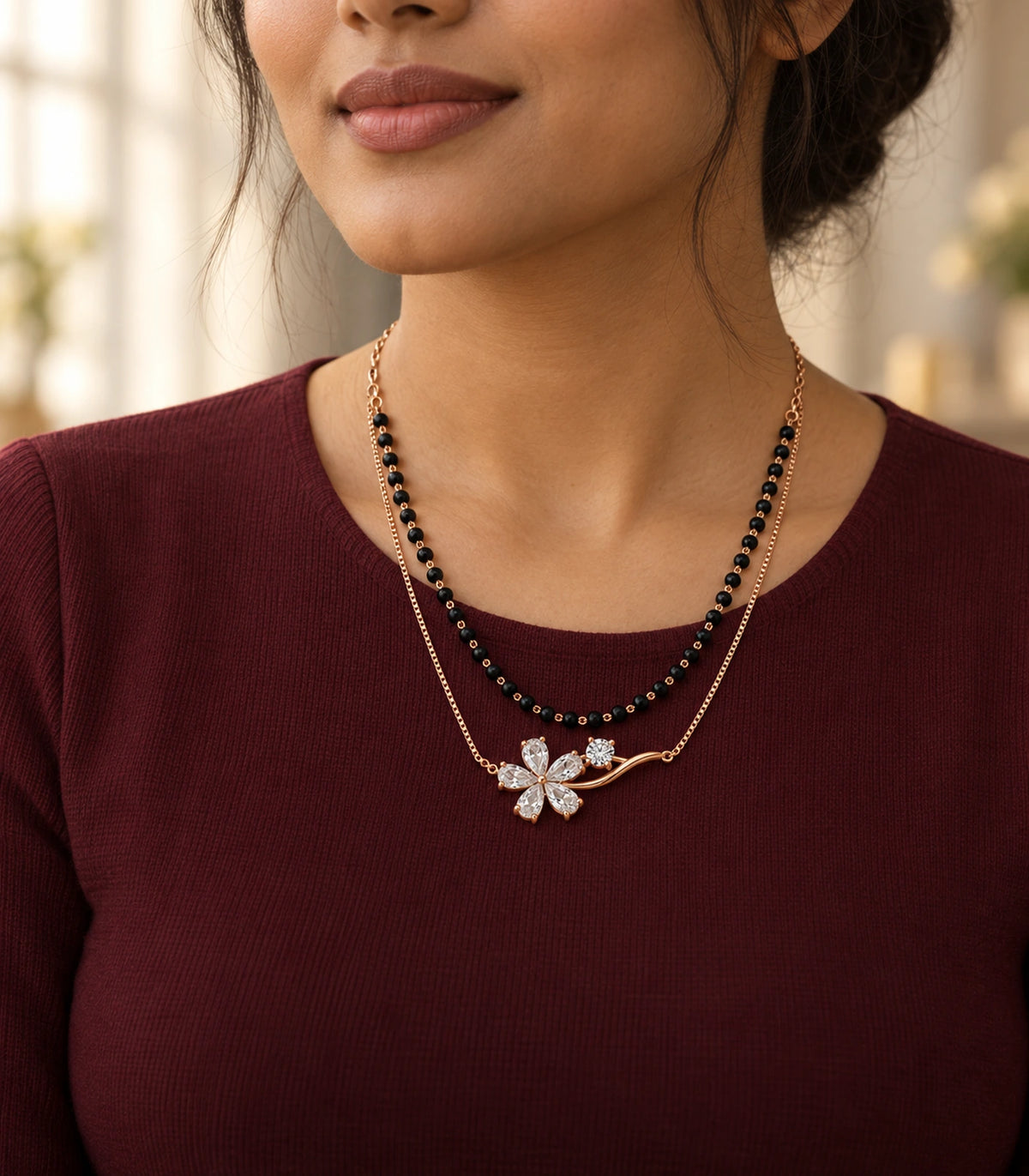 JIMIKI Rose-Gold Black-Bead Crystal-Flower Layered Necklace in Rose Gold / Black - editorial worn view #color_rose-gold-black