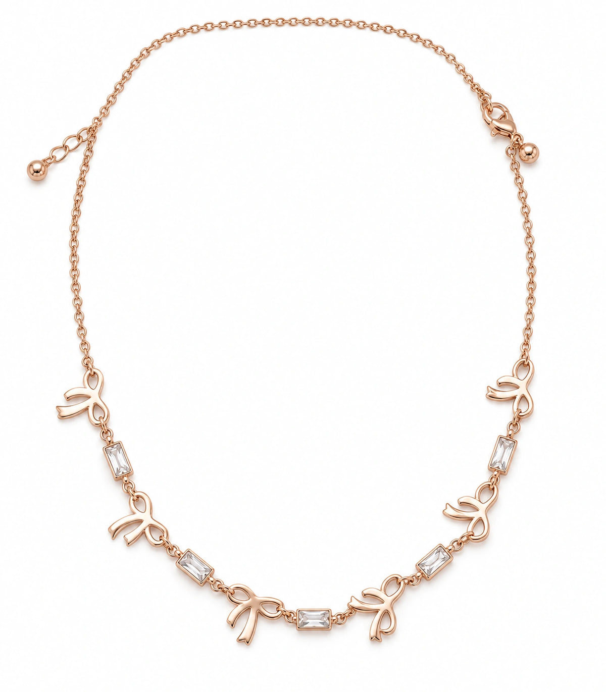 JIMIKI Rose Gold Bow Baguette Crystal Necklace in Rose Gold - necklace on white #color_rose-gold