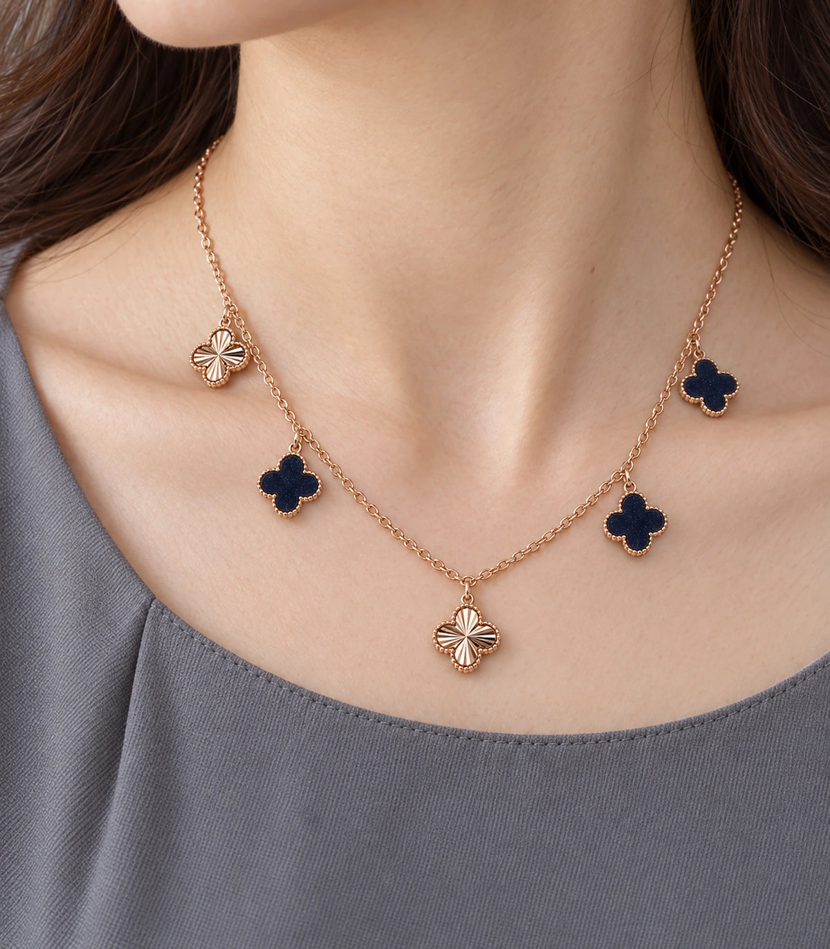 JIMIKI Rose Gold Dark Clover Charm Necklace in Rose Gold - close-up details #color_rose-gold