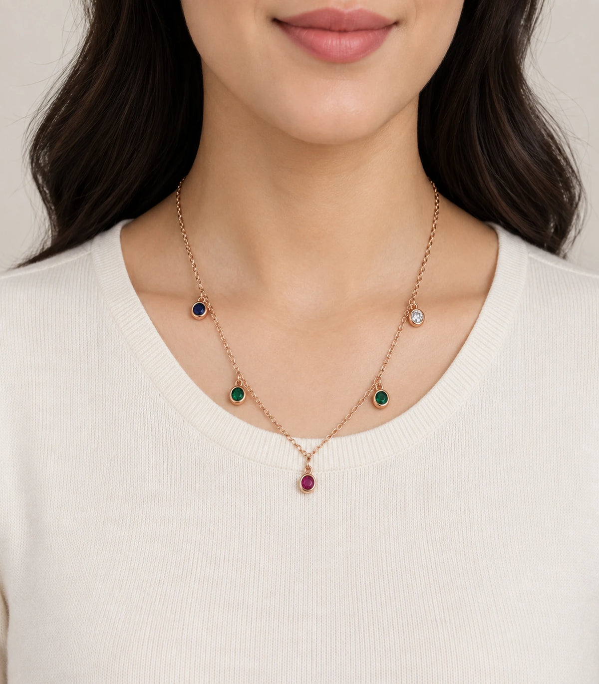 JIMIKI Rose Gold Multicolor Five-Stone Station Necklace, necklace worn with a cream knit top #color_multicolour