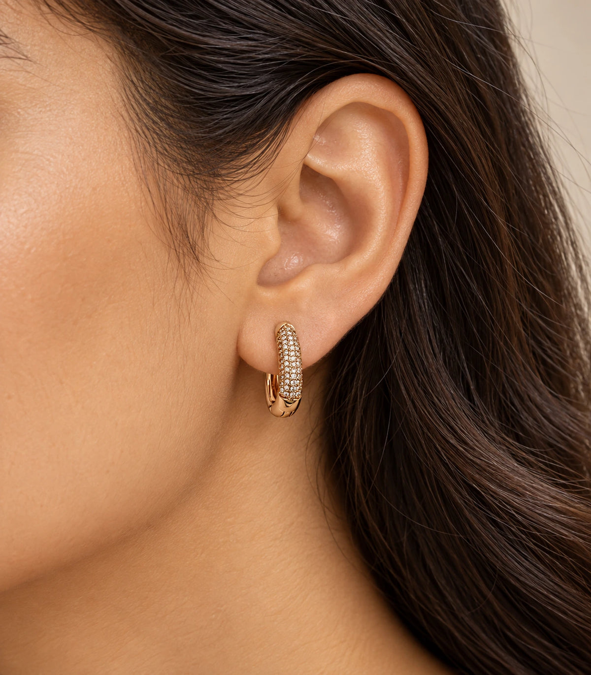 JIMIKI Pave Bar Huggie Hoop Earrings in Rose Gold Tone - editorial-model #color_rose-gold-tone