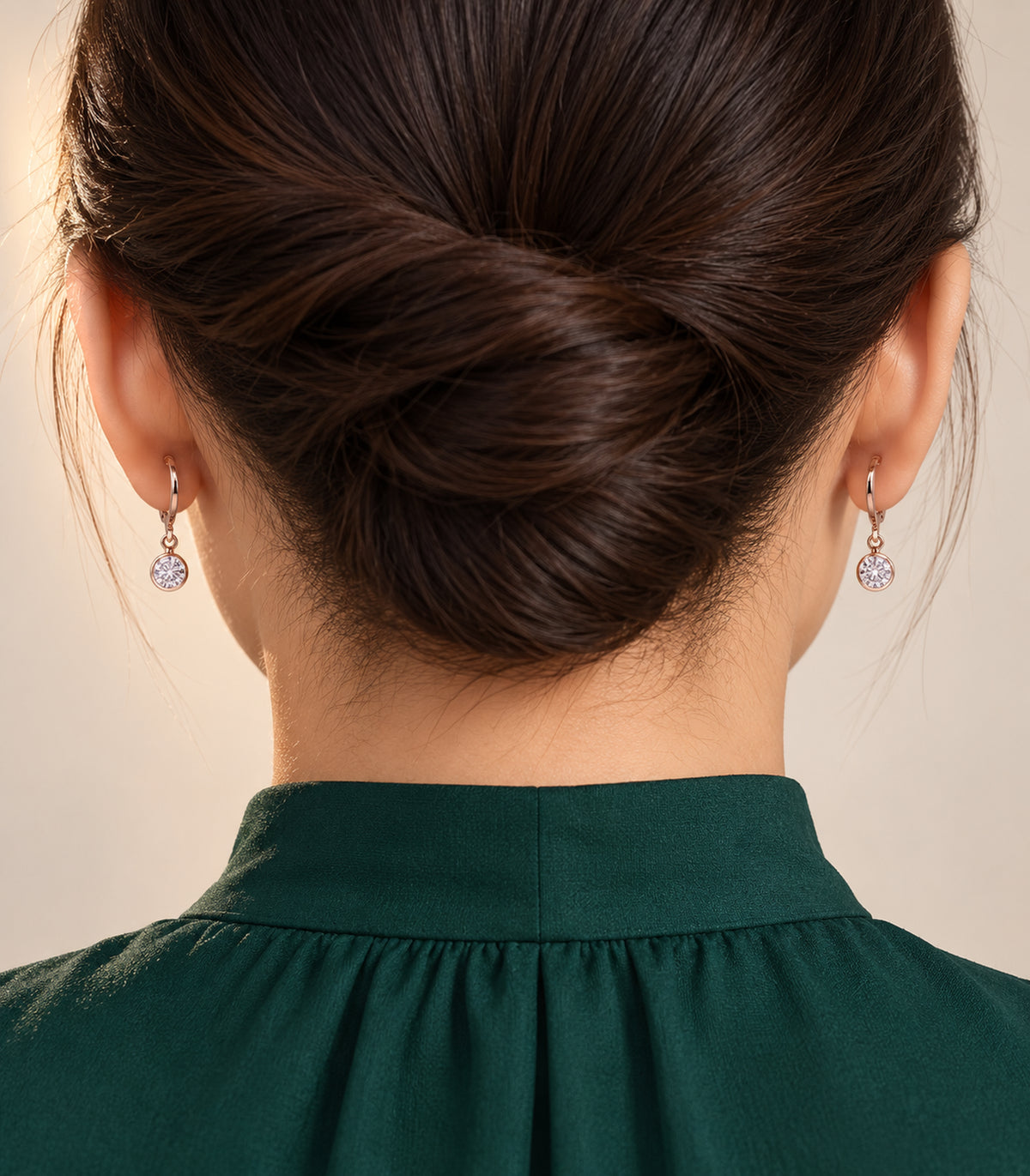 Rose gold tone hoop earrings in editorial worn styling