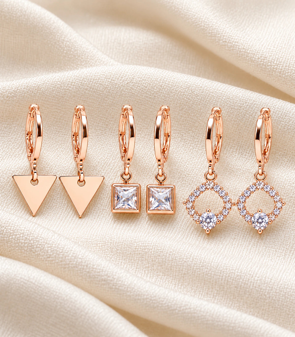 Rose Gold Tone Three-Pair Geometric Crystal Hoop Earring Set — complete six-earring set