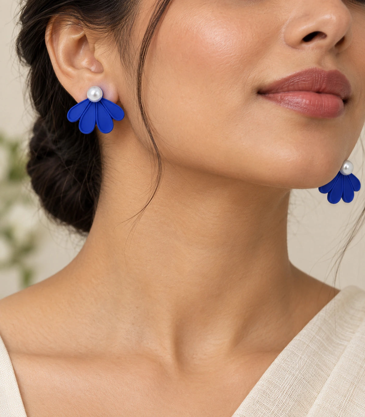 JIMIKI Royal Blue pearl fan petal stud earrings, styled worn editorial view #color_royal blue