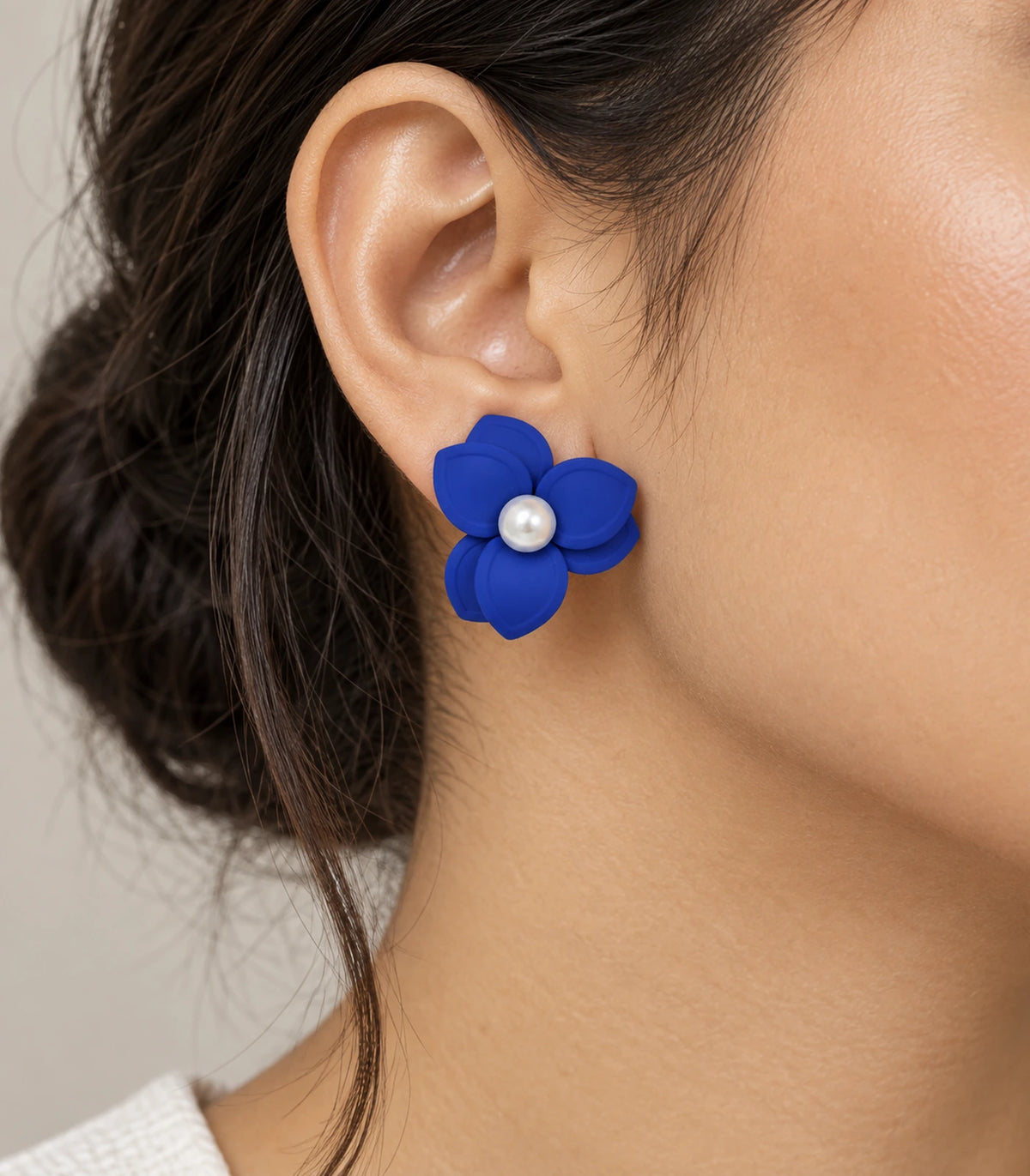 JIMIKI Royal Blue Triple Petal Pearl Flower Stud Earrings - earring worn on model #color_royal blue