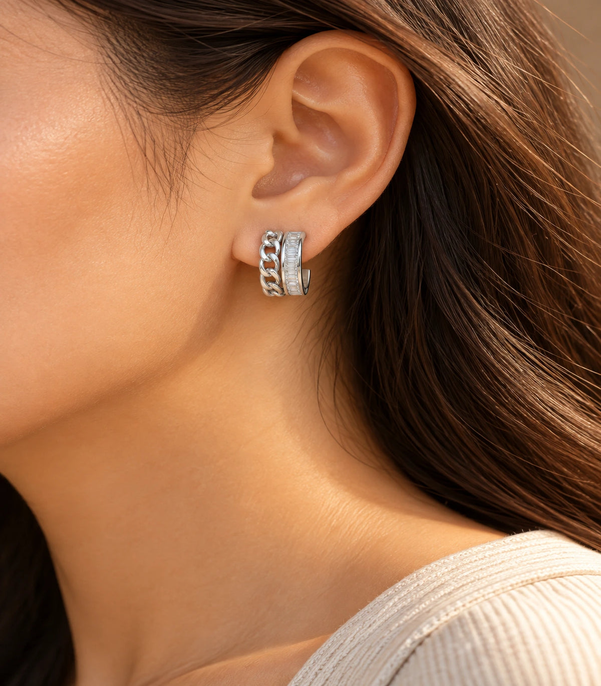 JIMIKI silver baguette chain double row huggie earrings, worn in warm editorial lighting #color_silver