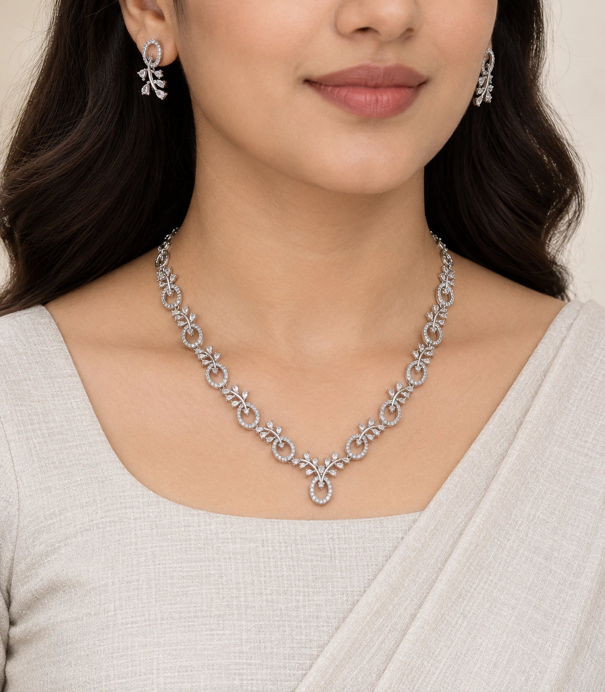 Silver Clear Floral Drop Crystal Necklace Set worn with an ivory outfit
