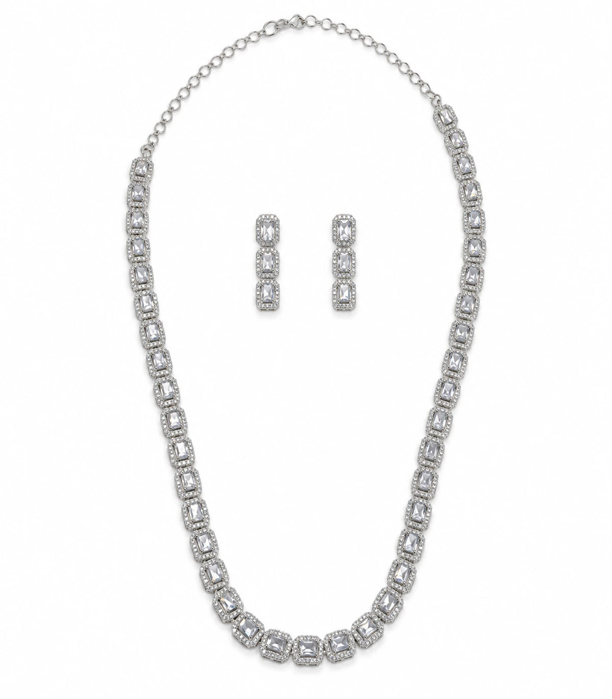 Complete silver-tone linked halo crystal necklace with matching three-section drop earring pair on white