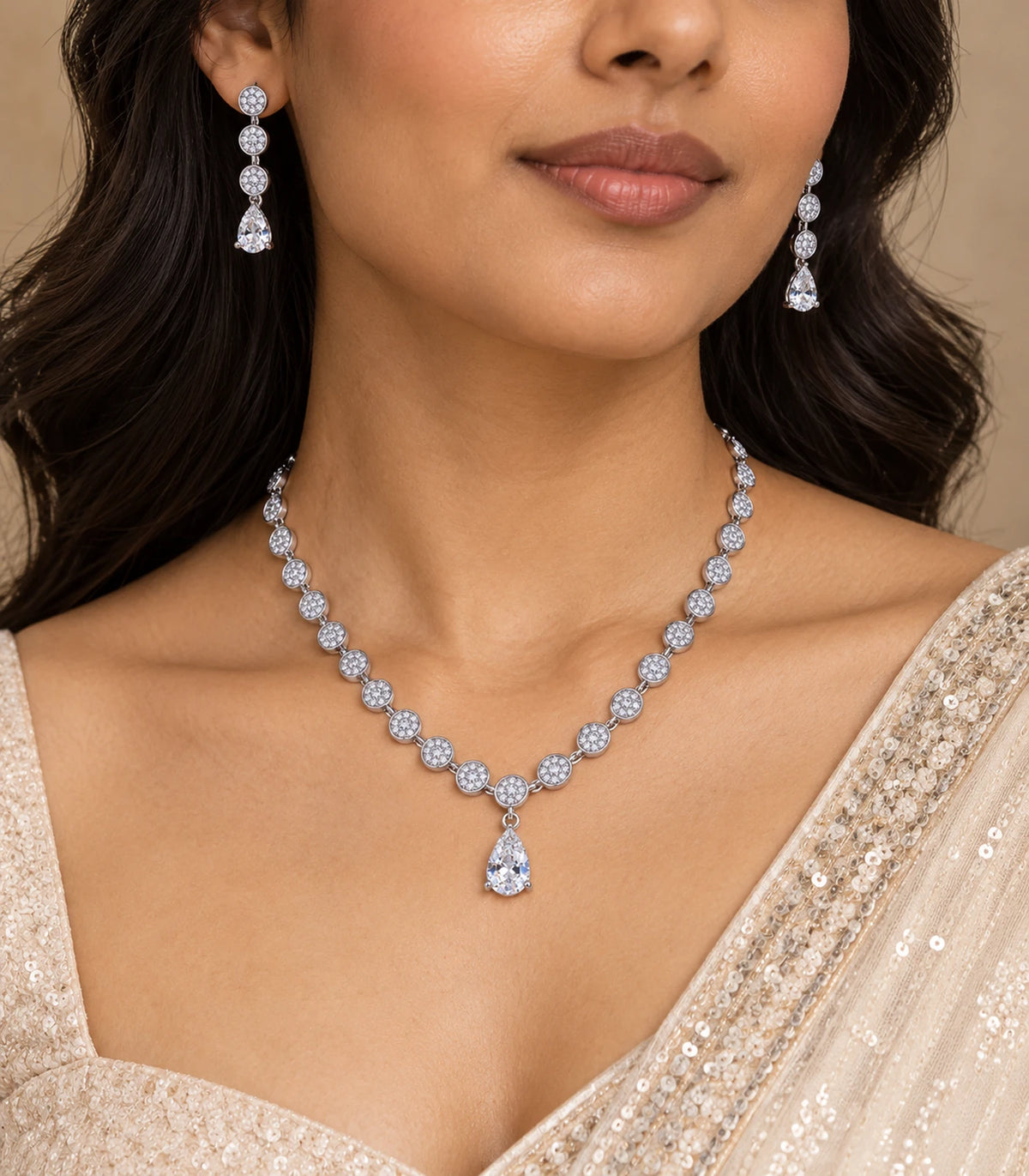 Silver clear round crystal drop necklace set and matching earrings in an editorial worn view
