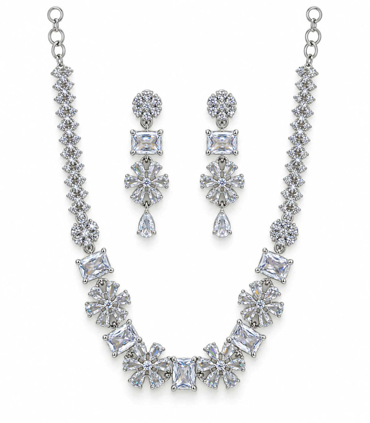 Complete silver-tone clear rectangular and floral necklace with matching drop earring pair on white